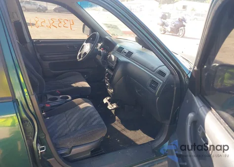 1999 Honda Cr-V Lx z USA, uszkodzony, nr VIN JHLRD1848XC041206